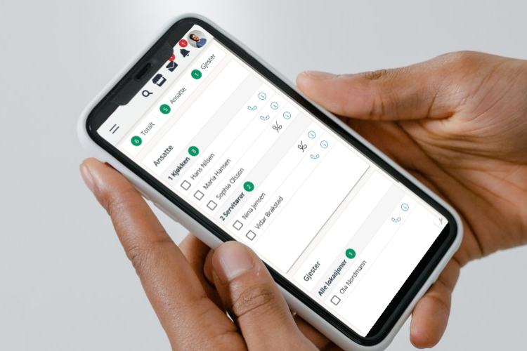 mobiltelefon som viser evakueringsliste med ansatte